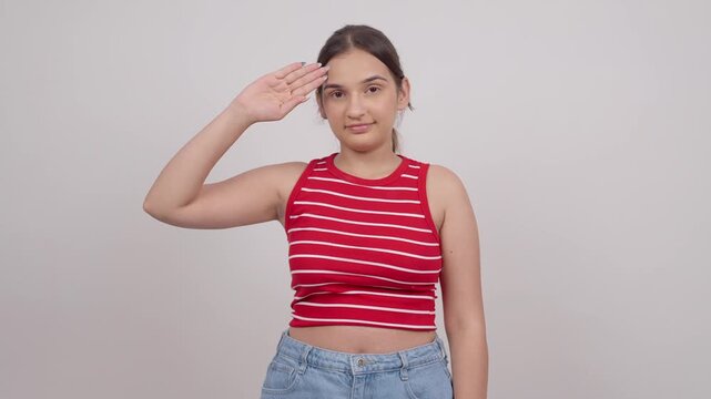 Indian Teenage Girl  Saluting at Camera