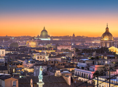 Rome, Italy historic cityscape with the Vatican in the distance at golden hour 268