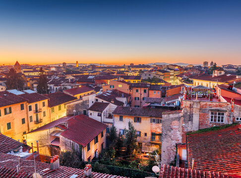 Pisa, Tuscany, Italy town skyline rooftop view at dawn 271