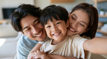 Obraz premium Joyful selfie of faceless boy enjoying relaxing moment with his parents at home, showcasing their happy faces and quality bonding time together, defocused family documentation,