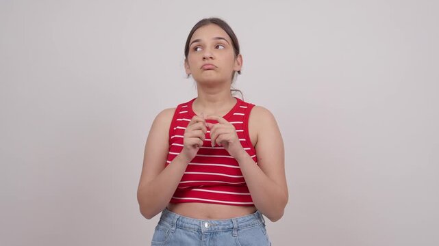 Stressed Indian Teenage Girl Thinking Looking Around