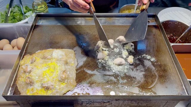 Korean Seafood Pancake &ndash; Oysters and Egg on Hot Plate Street Food