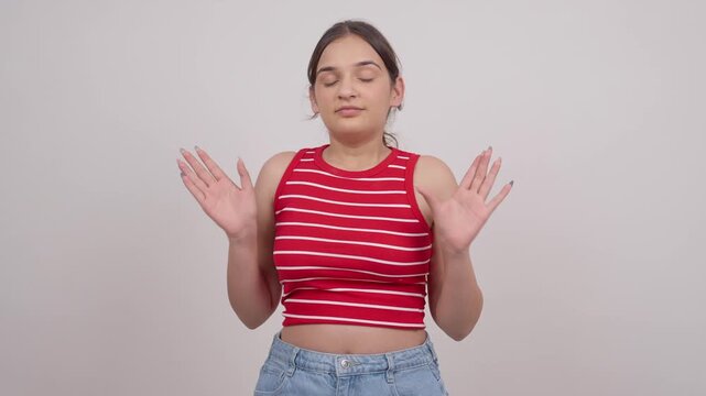 Indian Teenage Girl Relaxing and Taking Deep Breath