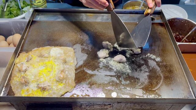 Korean Seafood Pancake &ndash; Oysters and Egg on Hot Plate Street Food