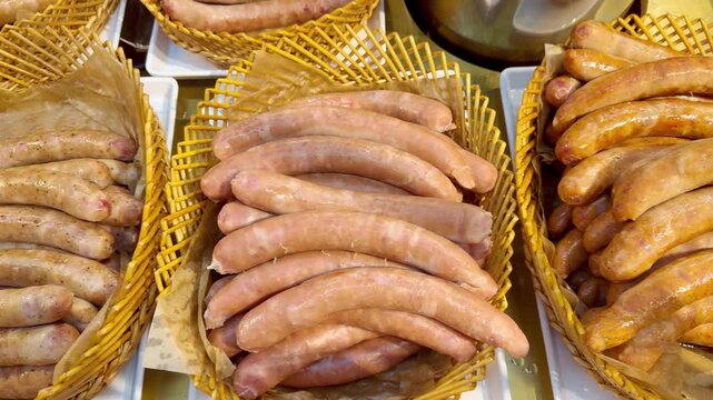 Assorted Sausages Displayed on Butcher Counter &ndash; Fresh Pork, Beef, Smoked and Cured Sausage Selection