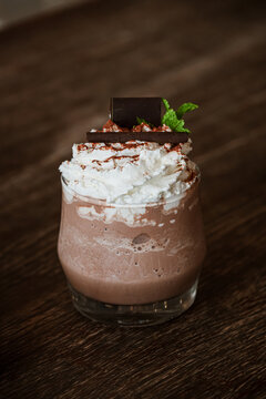Homemade delicious spicy hot chocolate with whipped cream.