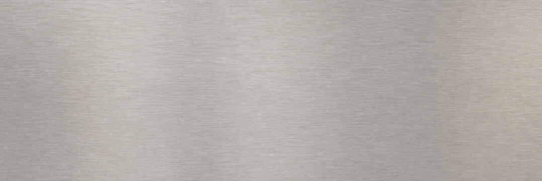 Brushed metal texture abstract background, silver steel surface, industrial material closeup, shiny steel pattern, reflective metallic gray wallpaper, modern technology design concept