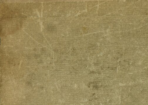 Vintage stained paper texture. Old frayed antique sheet paper.