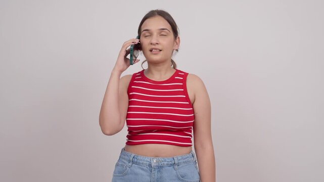 Indian Teenage Girl Talking on Mobile Phone