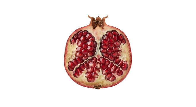 Fresh half pomegranate showing brilliant red juicy arils and seeds on black background