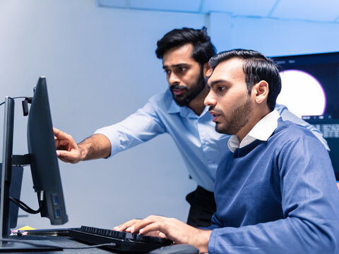 Team engineers software developers are brainstorming and using computer writing code to develop AI technology. Programmer using laptop work system about artificial intelligence and cyber security