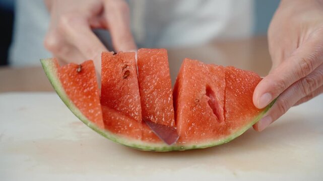Cutting Watermelon Flesh from Rind with Kitchen Knife