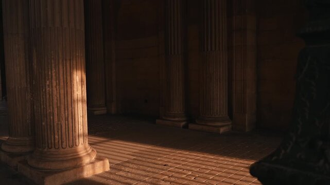 Historic Stone Colonnade With Light and Shadows