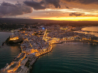 Fototapeta premium Aerial Night View of Vieste Medieval Town in Puglia Italy