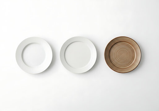 Three minimalist plates on display