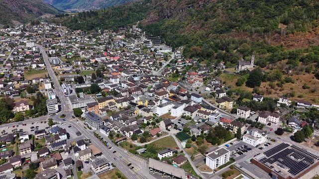 A panoramic aerial view beside the old town of the city Biasca in Switzerland on a sunny summer noon.