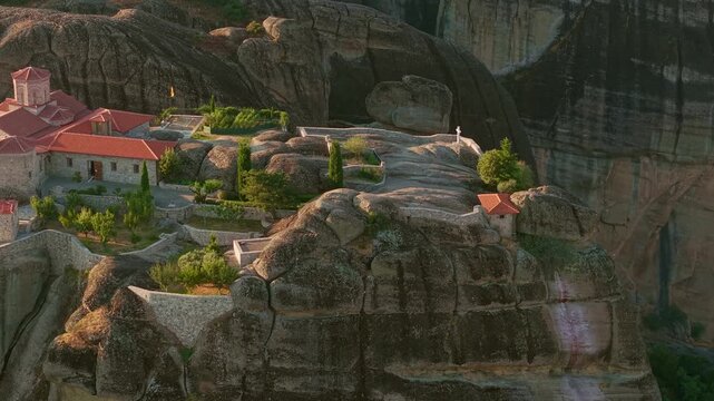 Aerial view of the Monastery of the Holy Trinity at Sunrise, Meteora, Greece