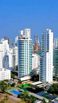 Aerial view of modern residential skyscrapers and swimming pool in Bocagrande, Cartagena, Colombia