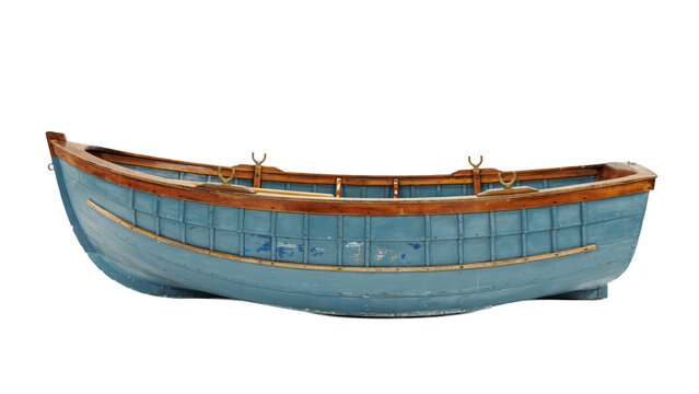 Small blue wooden rowboat with brown trim and metal oarlocks viewed from the side isolated on a transparent background