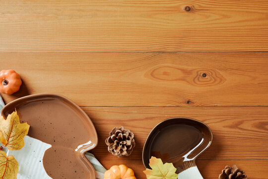 Fall table setting background with ceramic mushroom dishware