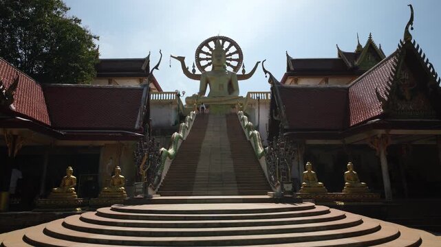 Majestic Golden Big Buddha Statue and Naga Steps at Wat Phra Yai Temple, Koh Samui, Thailand
