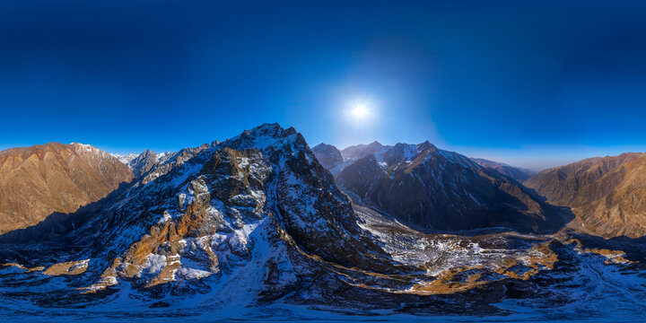 Kyrgyzstan Mountain Range Panorama with Snow and Sun