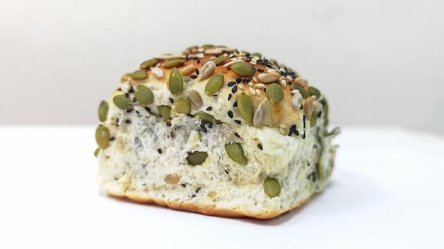 Healthy multigrain seed bread isolated on white background with copy space.