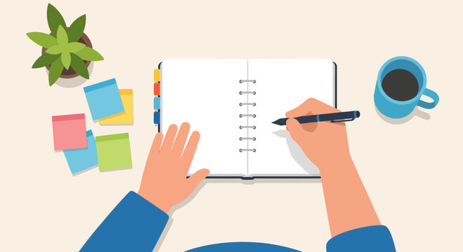 Hand writing in open notebook with plant and coffee cup overhead view