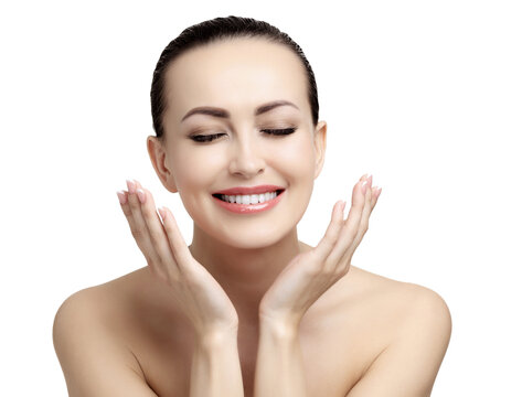Young happy pretty woman with smooth and clean skin is posing, isolated