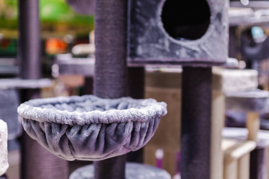 Gray Plush Cat Hammock on Multi-Level Cat Tree
