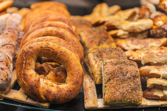 Assorted Fresh Breads and Bagels in Bakery Display