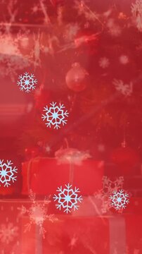 Animation of snowflakes over christmas tree and presents