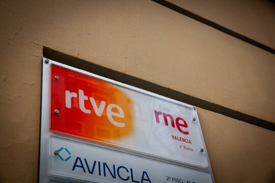 VALENCIA, SPAIN - FEBRUARY 27, 2026: RTVE and RNE logos on an office directory in Valencia, Spain, identifying Radio Nacional de Espana and the Spanish public broadcaster's regional media and radio wo
