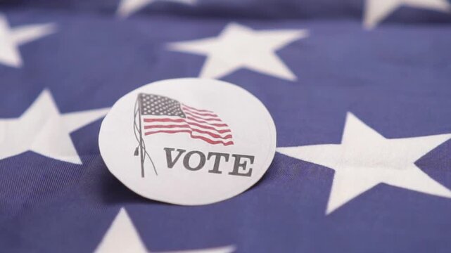 Vote election sticker on American flag background, concept of US presidential voting day