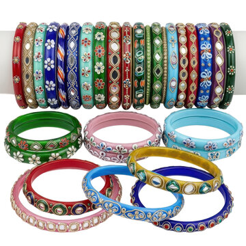 A vibrant collection of intricately designed ethnic bangles in various colors and patterns, showcasing traditional Indian jewelry with embellishments like floral motifs, mirrorings, and gemstones