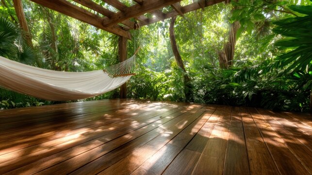 A serene hammock swaying gently in a tropical escape surrounded by vibrant green foliage, creating an inviting space for relaxation and tranquility amidst nature's beauty.