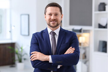 Fototapeta premium Portrait of successful lawyer in his office