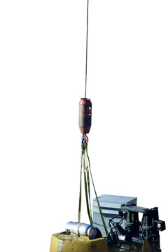 electrical equipment and fork lift next to slings and shackles on the hook of a crane Isolated on transparent background 