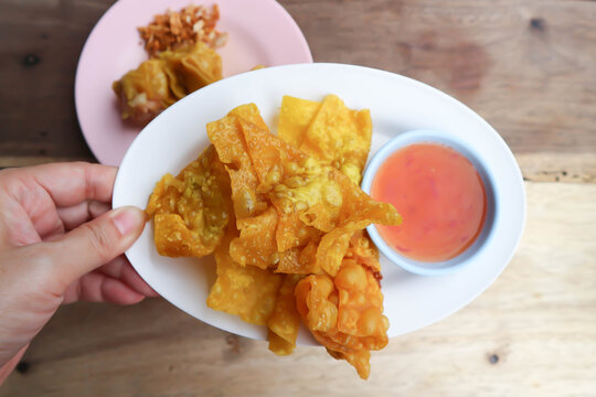 fried wonton, deep fried wonton or fried dumpling or deep fried dumpling and dip