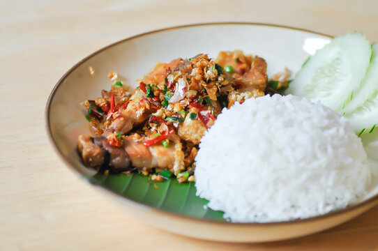stir fried pork or deep fried pork , fried pork or crispy pork and rice or  belly of pork