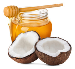 Honey in jar, dipper and coconut halves on white background