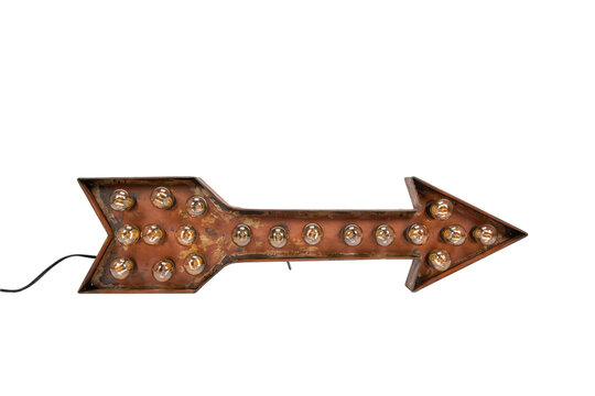 Rusty metal arrow sign with incandescent light bulbs pointing rightward isolated on a transparent background