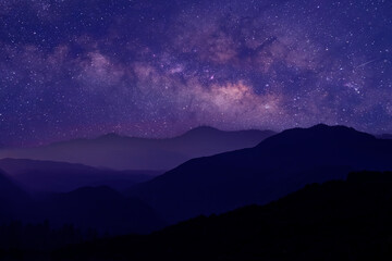 Beautiful night sky from milky way galaxy with stars and meteor over mountain