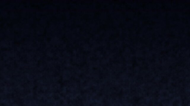 Abstract Motion Background with Dark Grunge Texture and Subtle Particle Effects