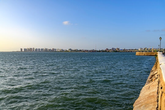 View of the city of Sao Luis, with its skyscrapers and the walls of its historic center by the sea.