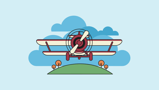 Beautiful vintage red propeller biplane flying high in the blue sky above a green hill with small orange autumn trees.