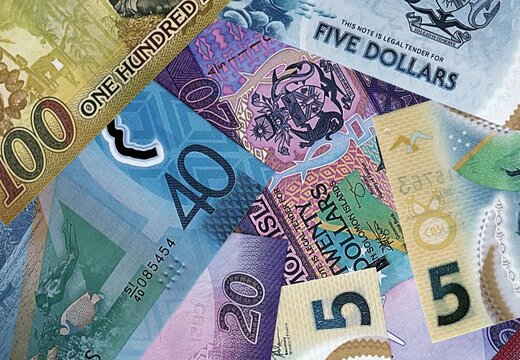 Solomon Islands dollar money bills in pile. Big amount of Solomon Islands SBD currency cash close up