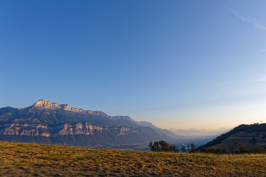 Sunrise lights the summits of Chartreuse in french Alps