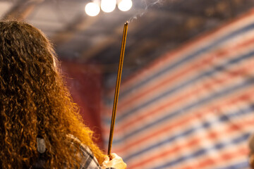Obraz premium Worshippers Holding Incense at Xiahai City God Temple
