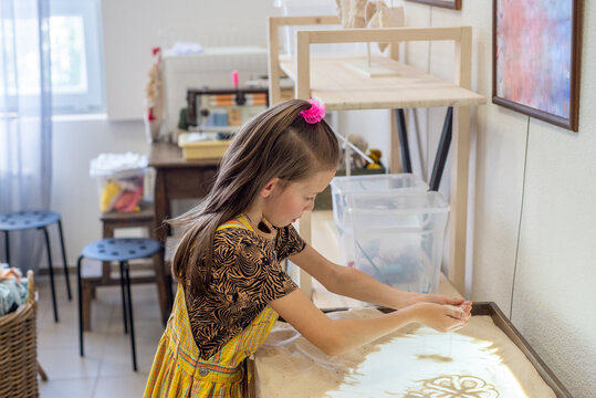 Art therapy for children. Sand animation and sand painting
